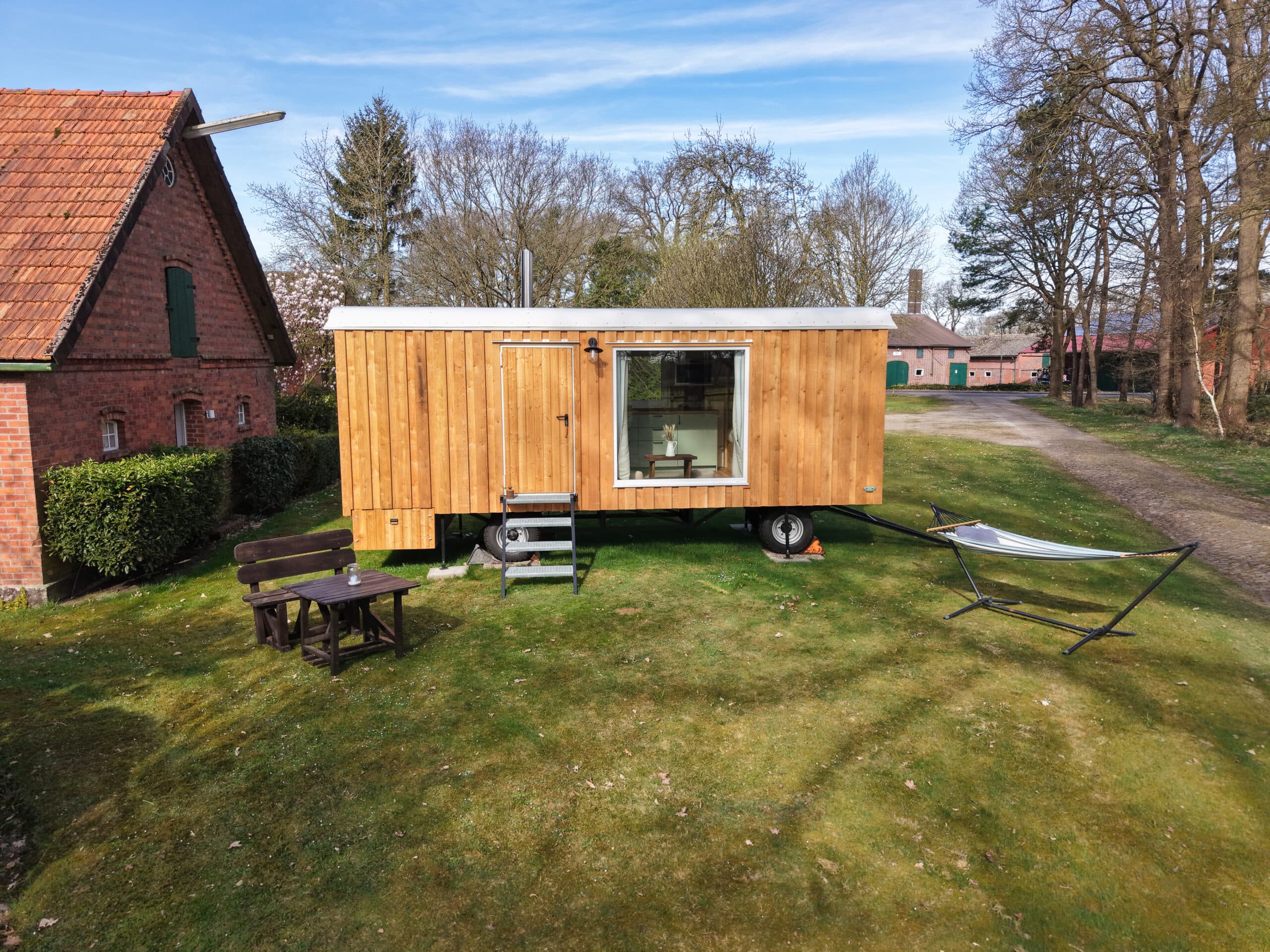 Wóz mieszkalny Lehmhütte, 17,5 m² — Bauwagen Manufaktur (Viola Briere-Edney)