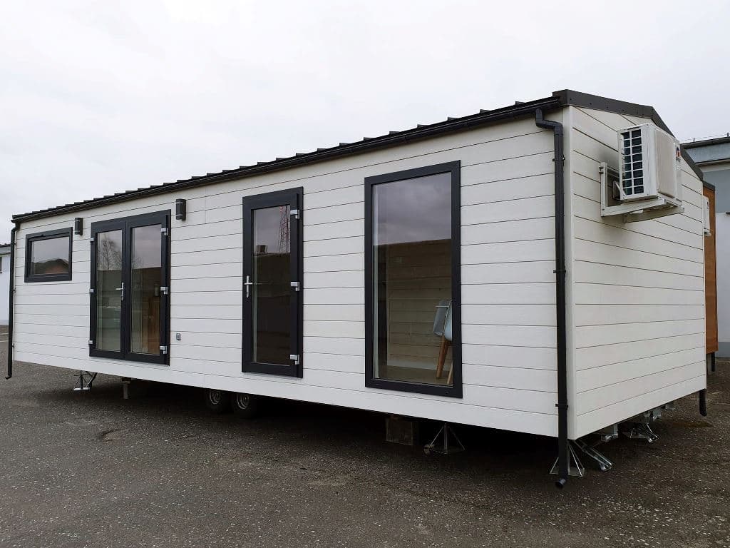 Dom mobilny SOL 40 m² na stalowej ramie z kołami — Deck House (DECK-HOUSE s.c.)