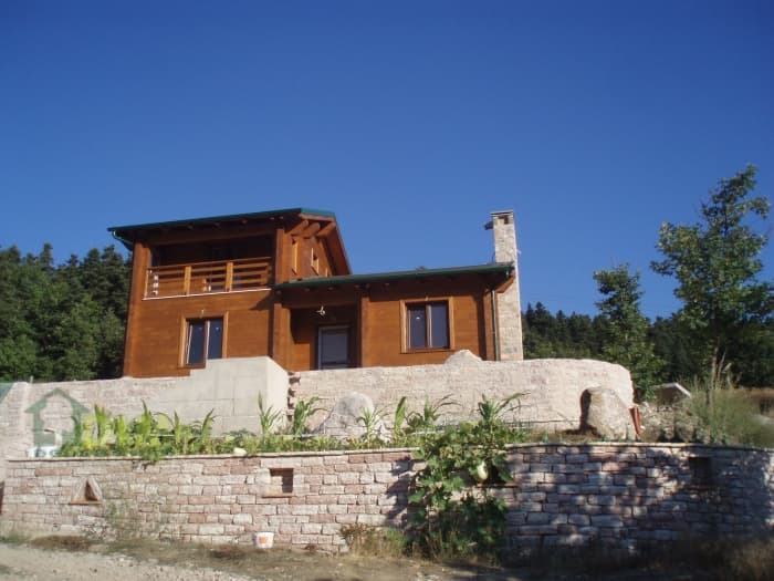 Dom z bala klejonego Grecja — 97 m² z wiatą na samochód — Drewniany Dom (ТзОВ „Дерев’яний Дім”)