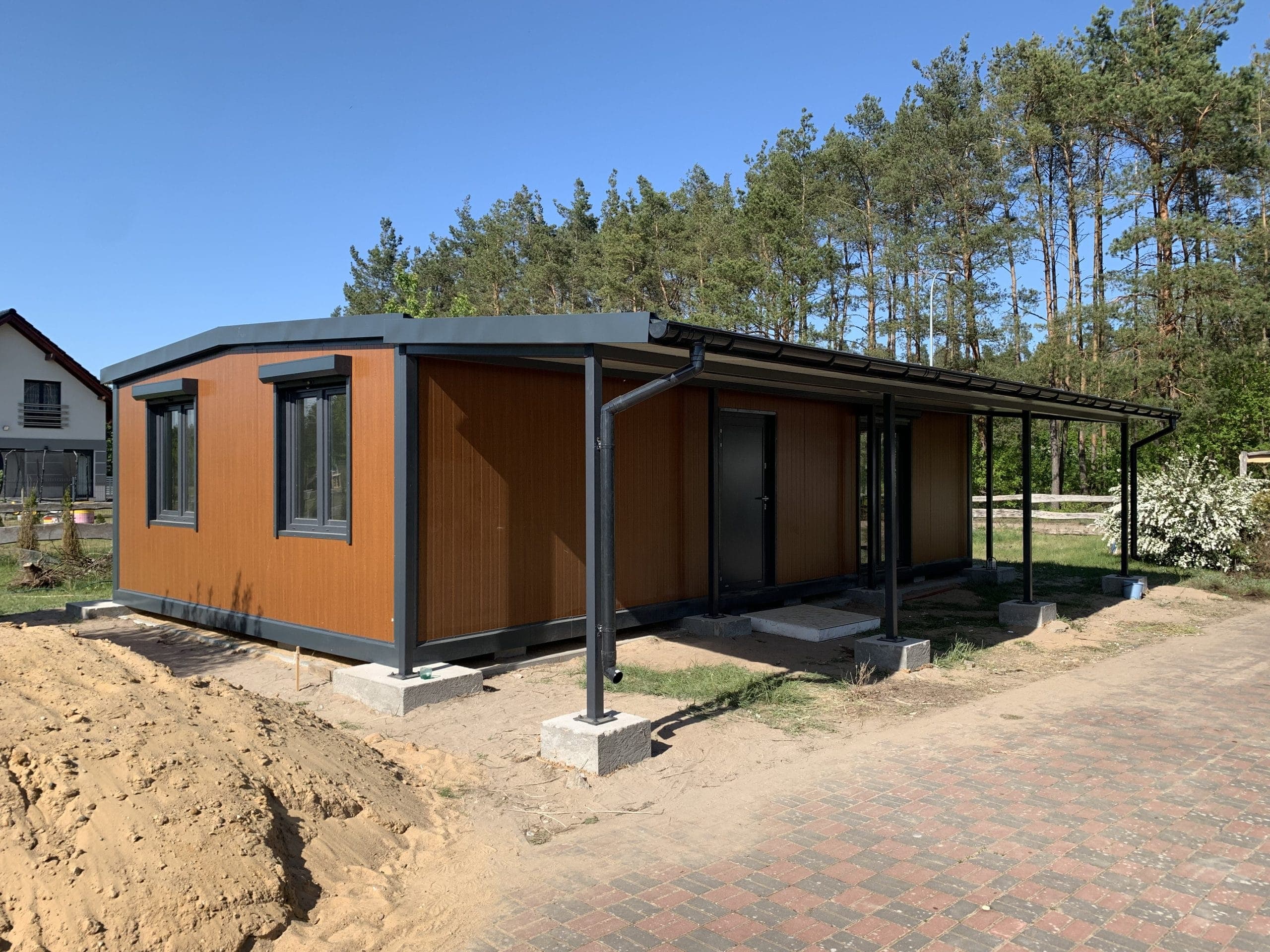 Pawilon mieszkalny 11 × 6 m, złoty dąb — 66 m² — DSW Constructions Sp. z o.o. (Pawilony.pl)