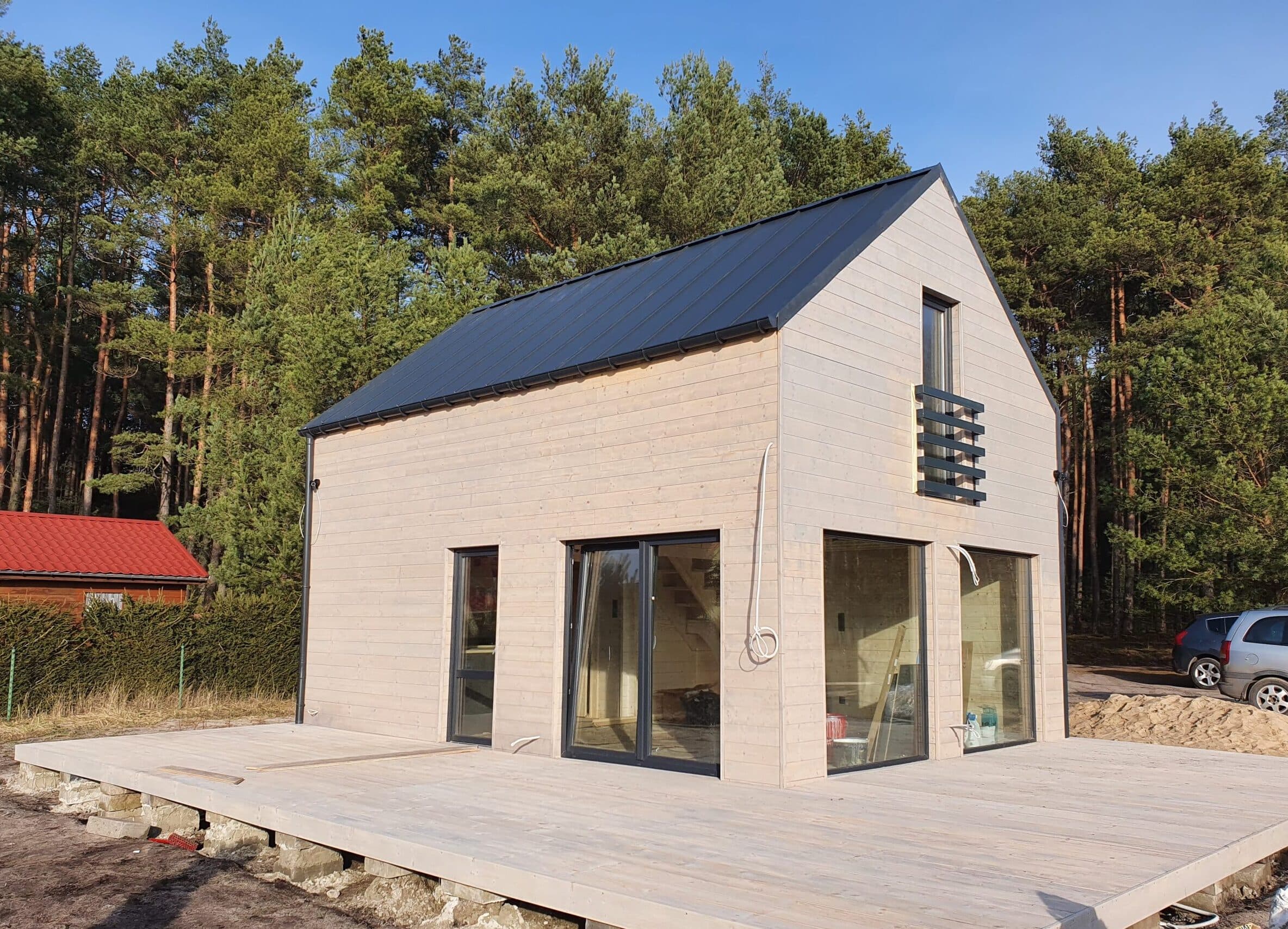 Domek piętrowy z balika Sardynia — 35 + 35 m², elewacja z blachy na rąbek — model domu