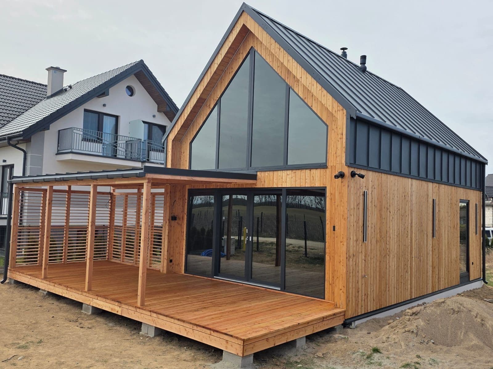 Dom szkieletowy Stodoła 50 — z poddaszem użytkowym, ok. 50 m² — model domu