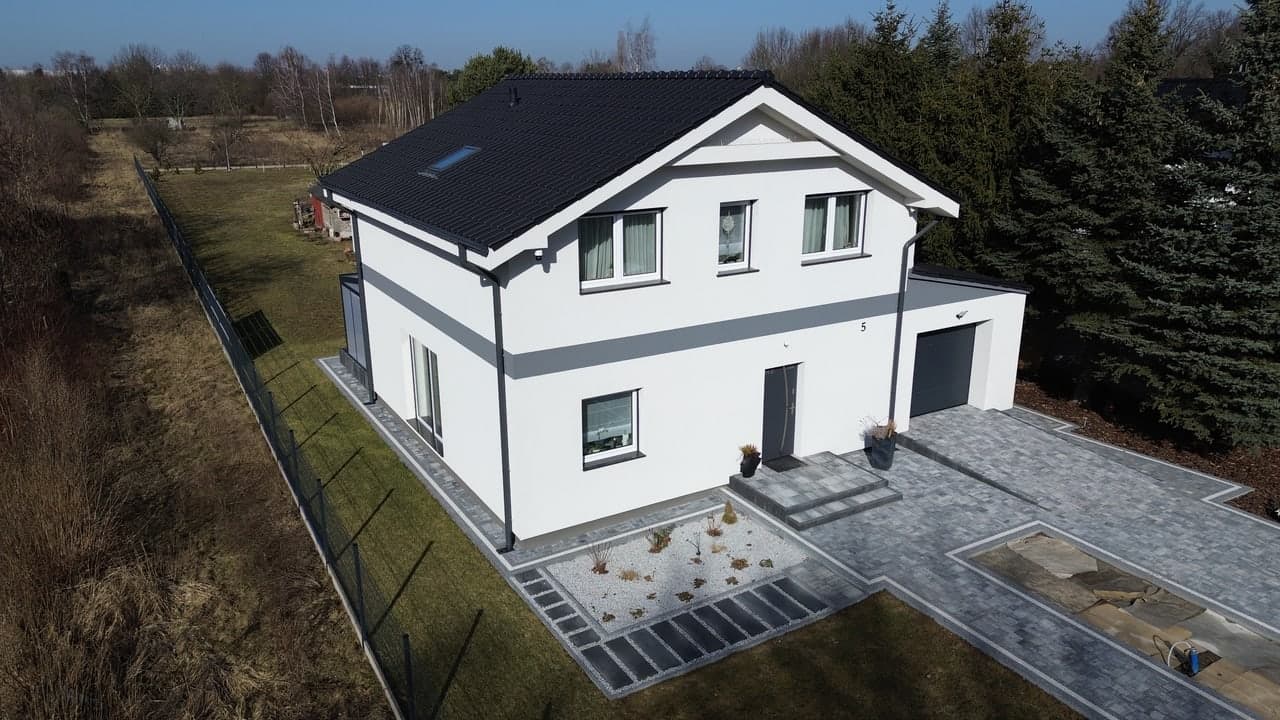 Dom z poddaszem, garażem i ogrodem zimowym 153 m² w Spławiu — Marwel Home s.c. Arkadiusz Marciniak, Robert Welenc