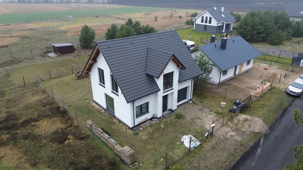Dom z poddaszem użytkowym i garażem 130,9 m² w Murzynowie Leśnym, Marwel Home