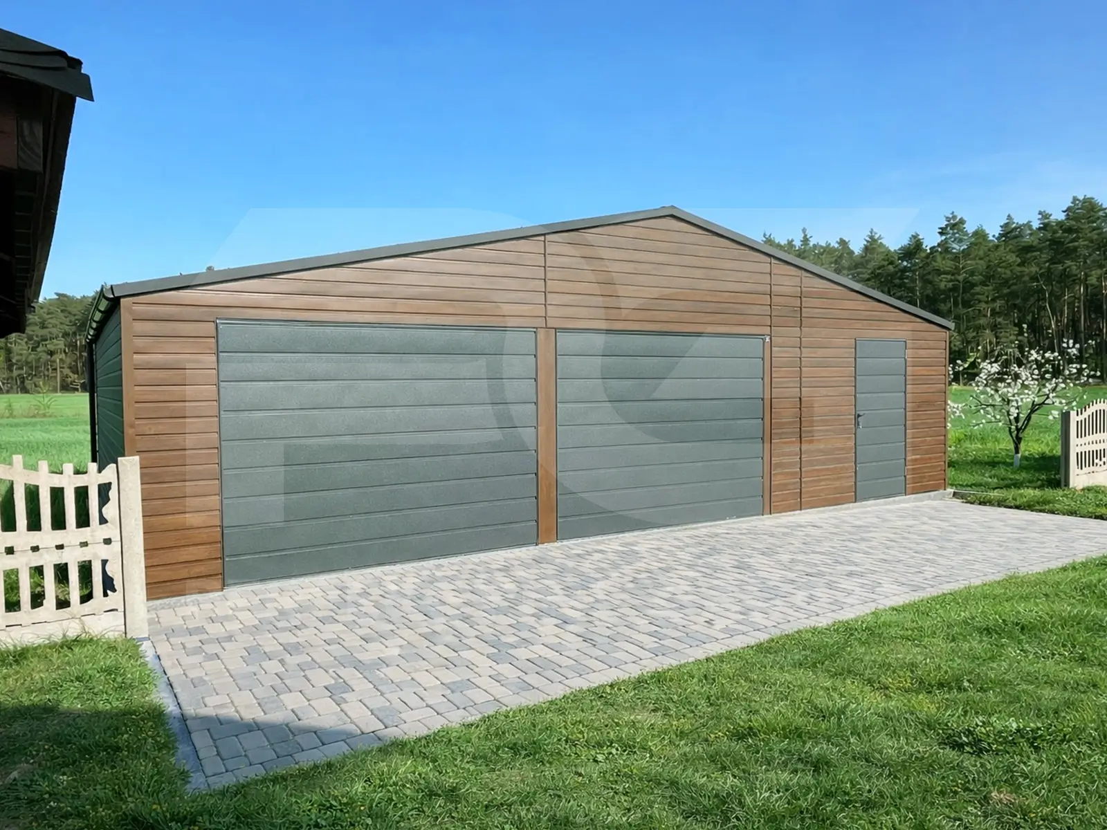 Garaż blaszany 10 × 6 m Premium, orzech, dwie bramy i drzwi — Perfekcyjne Garaże (M-Trans Paweł Murzyn)