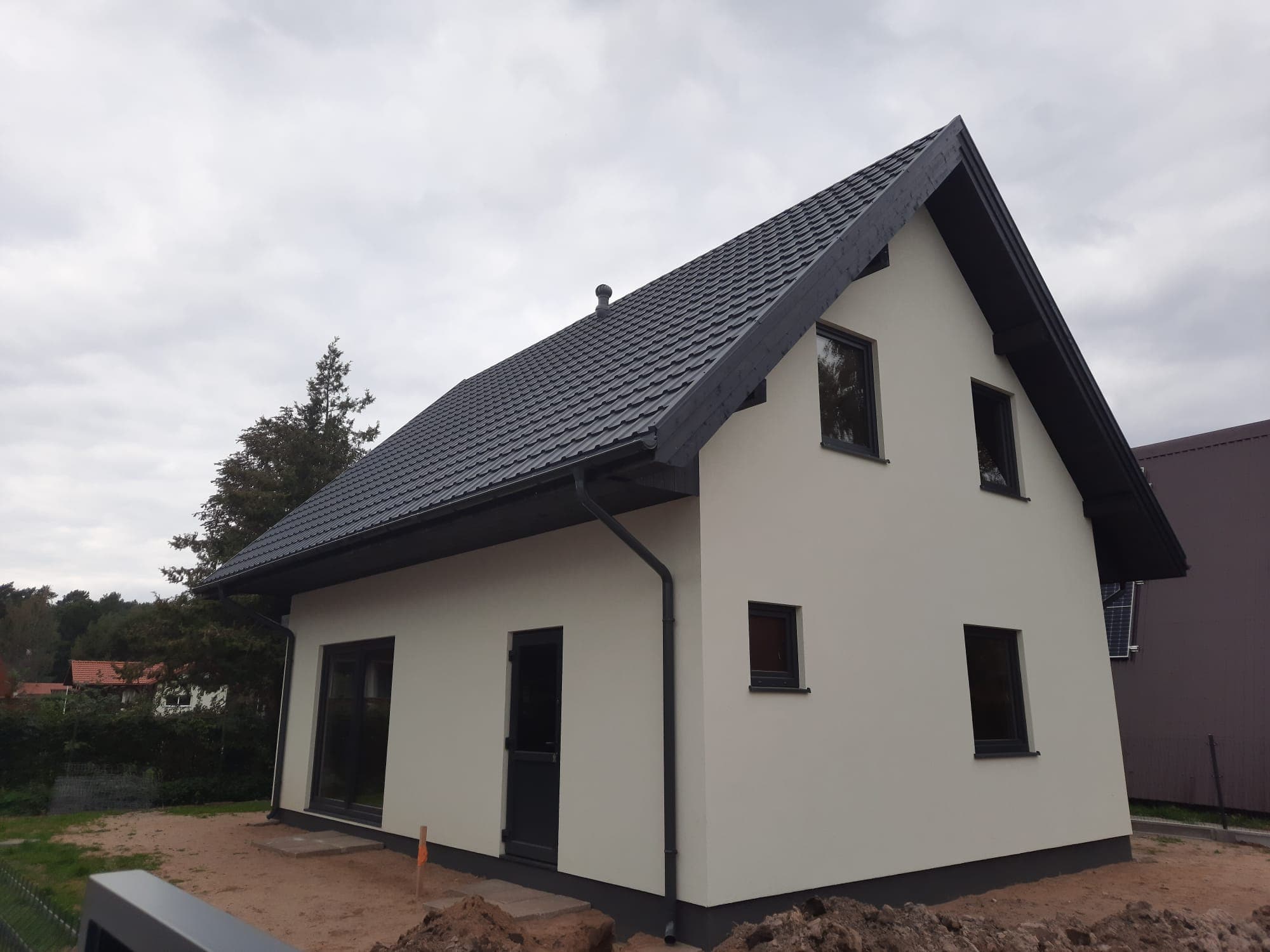 Dom 55 m² zabudowy z poddaszem w Rowach, Trehaus