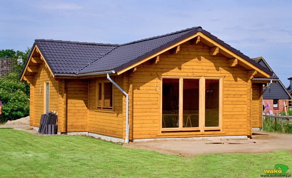 Dom letniskowy z bali T55 — 55 m², plan litery L — Wakodomy Piotr Morawski (Wako Domy)