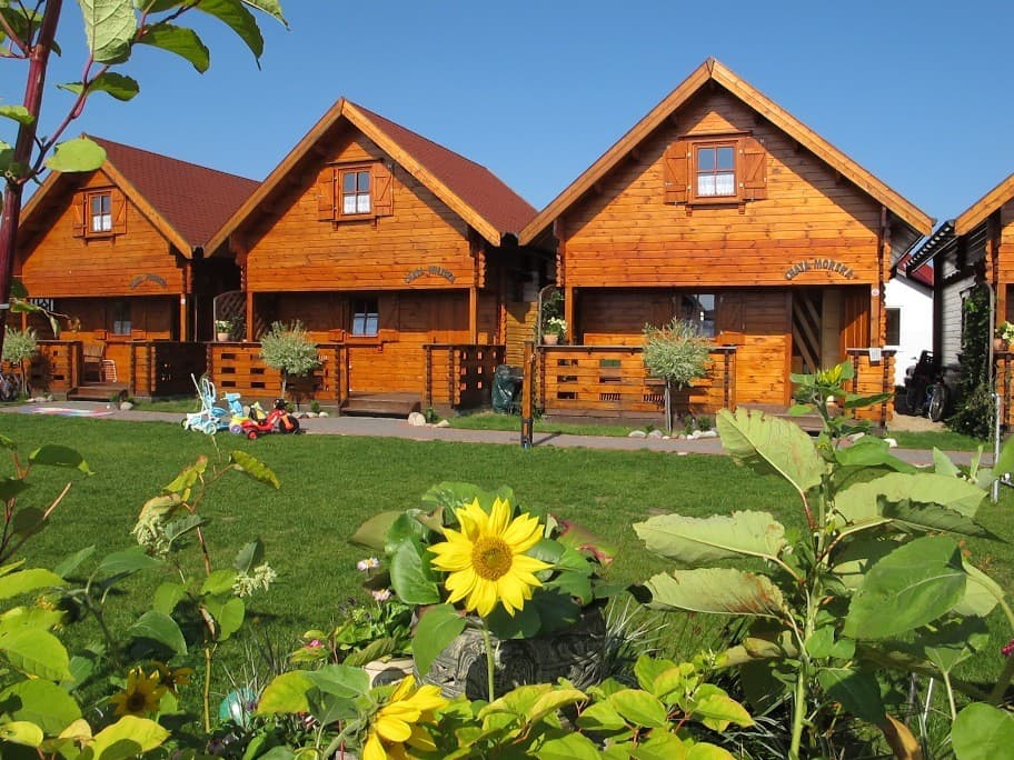 Domek letniskowy z bali Ewa 3 — z poddaszem, 52 m² — model domu